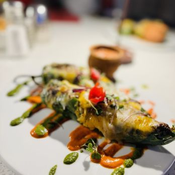 Banaras Indian Restaurant signature dishes Butter ChickenLamb Shank Rogan JoshTandoori Sea Bass